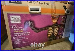 12 ft. Home Accents Holiday Rotten Patch Giant-Sized Inferno Pumpkin Skeleton