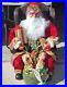 31_Santa_Claus_Sitting_in_Wing_Chair_Holiday_Christmas_Display_presents_toys_01_bh