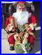 31_Santa_Claus_Sitting_in_Wing_Chair_Holiday_Christmas_Display_presents_toys_01_zl