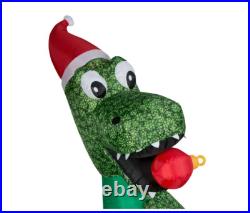 8.5' Inflatable LED Christmas T-Rex Biting Ornament Yard Decoration 8.5' Inflatable LED Christmas T-Rex Biting Ornament Yard Decoration