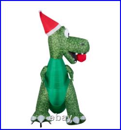 8.5' Inflatable LED Christmas T-Rex Biting Ornament Yard Decoration 8.5' Inflatable LED Christmas T-Rex Biting Ornament Yard Decoration