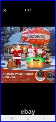 9ft tall hot air balloon blimp carrying santa and snow man. Twinkling lights