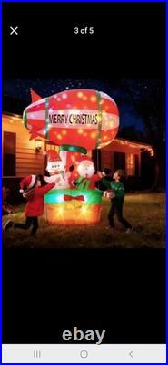 9ft tall hot air balloon blimp carrying santa and snow man. Twinkling lights