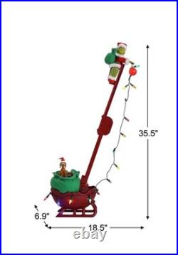 Animated Musical LED Grinch Utility Sleigh Christmas Tree Side Decor. New