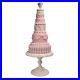 December_Diamonds_Large_Pink_Tiered_Cake_On_Pedestal_01_vuo