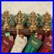 Fleur_de_Lis_Stocking_Holders_Antique_Gold_Set_of_Four_01_uzpr