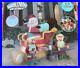 Gemmy_6_Christmas_Lighted_Animated_Santa_Elves_Fix_Sleigh_Airblown_Inflatable_01_pag