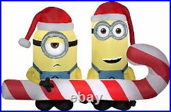 Gemmy Inflatable Minions Carrying Candy Cane minion christmas inflatable