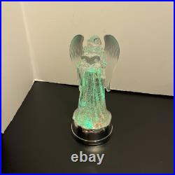 Gerson 13 In Lighted Angel Water Lantern Snow Globe with Continuous Swirling on