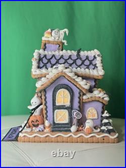 Ghoulish 12 Purple Haunted Gingerbread House LED Light-Up with Ghosts & Pumpkins