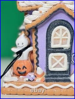 Ghoulish 12 Purple Haunted Gingerbread House LED Light-Up with Ghosts & Pumpkins