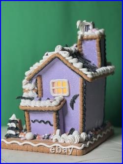Ghoulish 12 Purple Haunted Gingerbread House LED Light-Up with Ghosts & Pumpkins