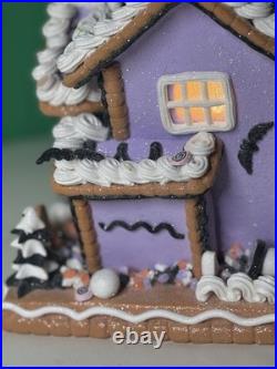 Ghoulish 12 Purple Haunted Gingerbread House LED Light-Up with Ghosts & Pumpkins