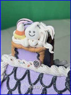 Ghoulish 12 Purple Haunted Gingerbread House LED Light-Up with Ghosts & Pumpkins