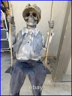 Halloween Express Animated Swinging Skeletal Boy Halloween Decoration Size 62