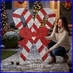 Home Accents 5ft Candy Canes Twinkling LED Icicle Shimmer Red Bow