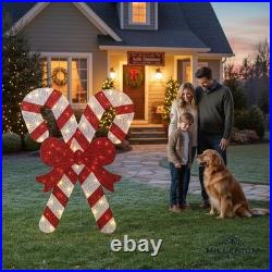 Home Accents 5ft Candy Canes Twinkling LED Icicle Shimmer Red Bow