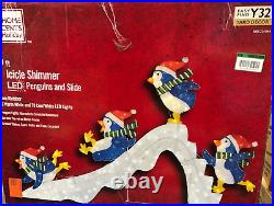 Home Accents Holiday 6 Ft Icicle Shimmer LED Penguins and Slide