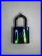 Louis_Vuitton_Iridescent_glass_padlock_with_LV_logo_01_ou