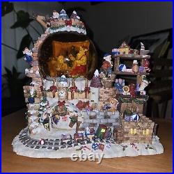 Santa & Elves Rotating Musical Christmas Snow Globe plays Jingle Bells 10. 5