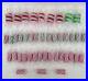 Vintage_Lot_of_42_Christmas_Ornaments_Cylinder_Ribbon_Candy_Red_White_Green_01_rj