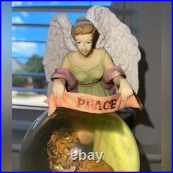 Vintage Silvestri Musical Snow Globe withAngel Watching Over- Plays Silver bells