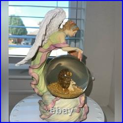 Vintage Silvestri Musical Snow Globe withAngel Watching Over- Plays Silver bells